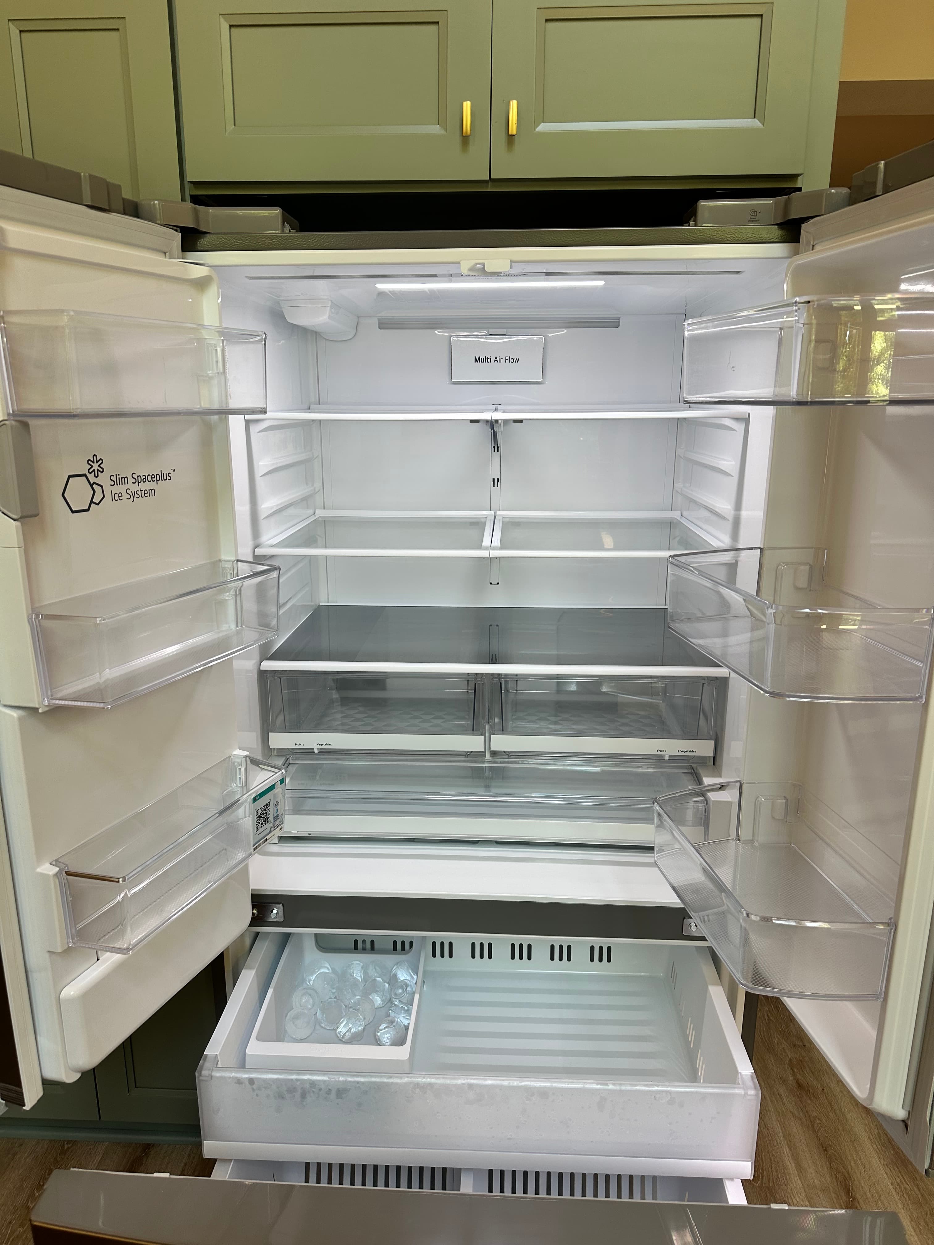 Clean refrigerator interior after move-in or move-out cleaning