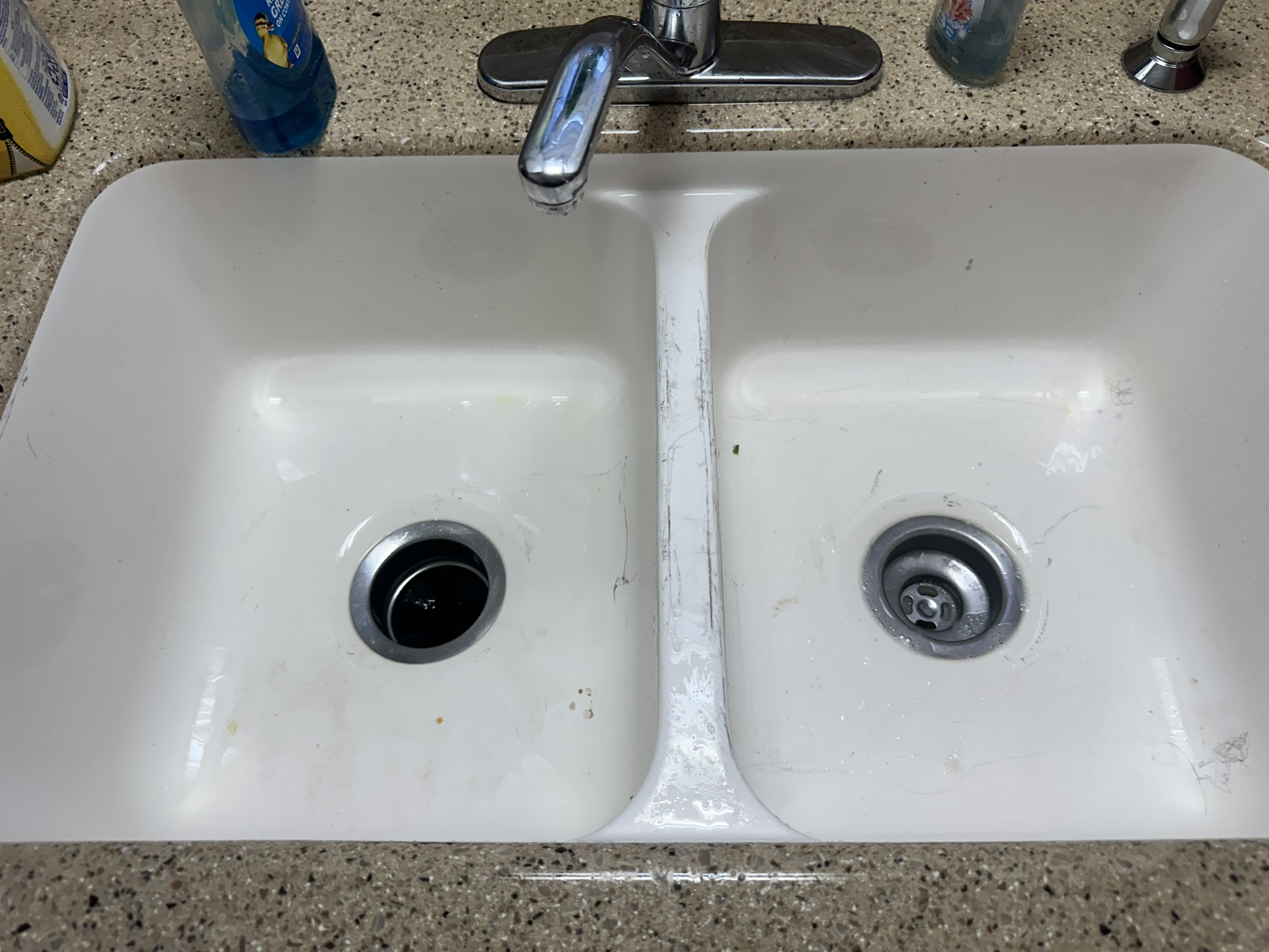 Clean sink and counter after empty-home cleaning